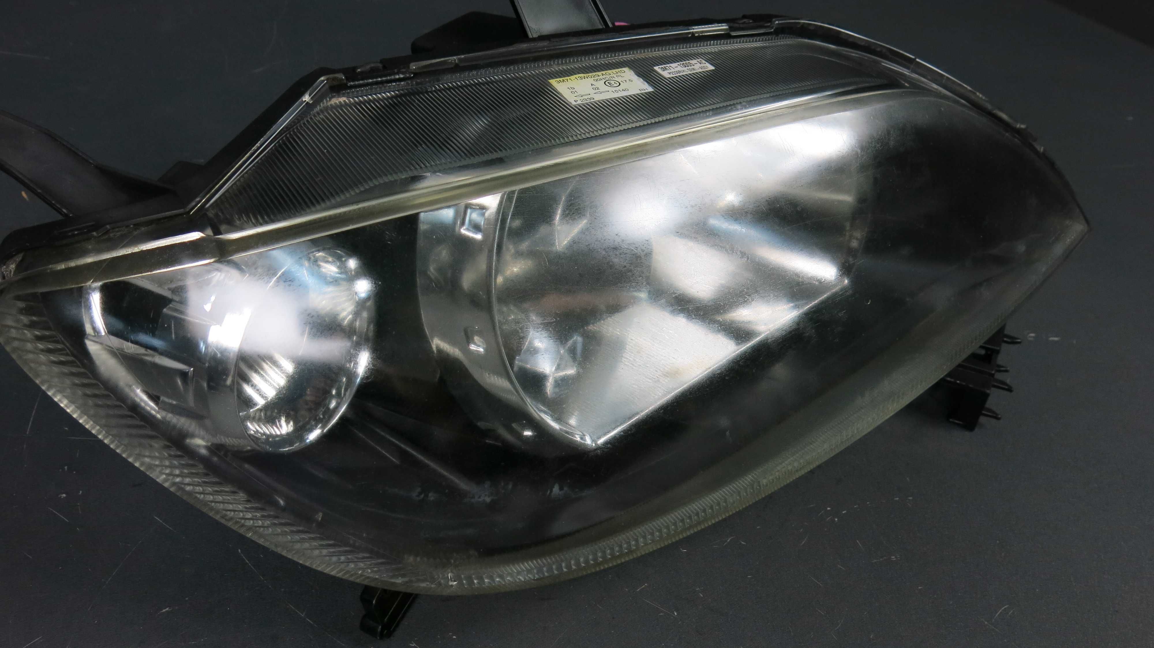 Mazda 2 lampa reflektor przedni przód prawy Europa