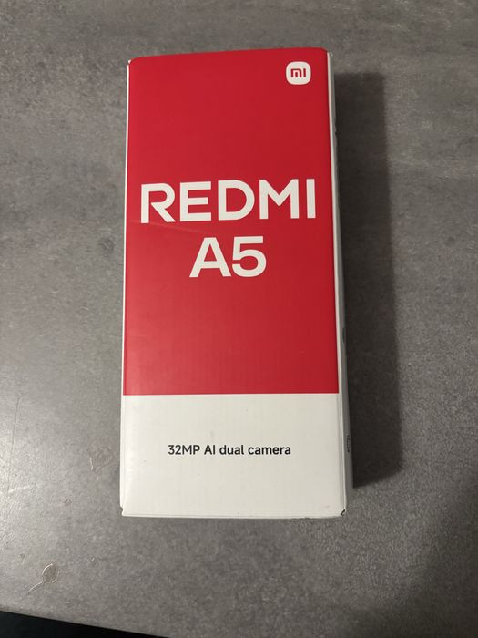 Telefon dotykowy Xiaomi Redmi A5 czarny/złote dodatki nowy