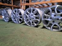 05 TSM alufelgi 4x100 5.5x15 et52 54.1 kia oryginalne srebrne polerowa