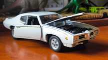 Машинка Pontiac GTO 1989 1/24 Welly