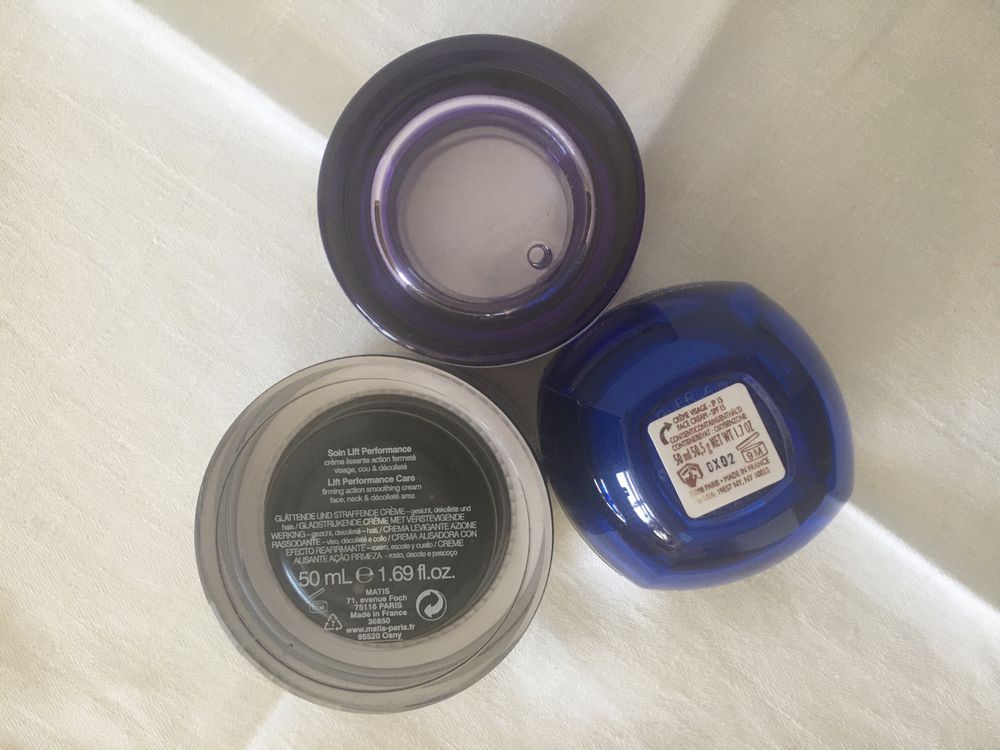 Пустые баночки от крема  Lancome .