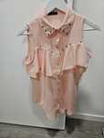 Blusa rosa com pérolas