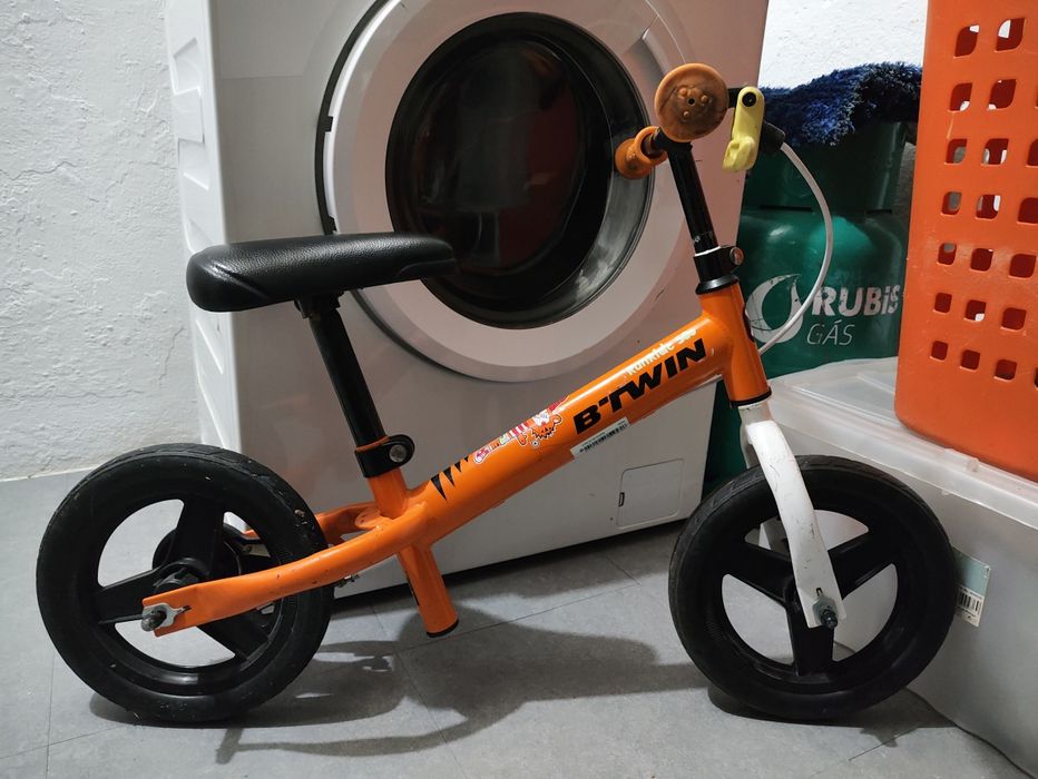 Bicicleta sem pedais criança 10 polegadas RUNRIDE 500 B'TWIN Laranja