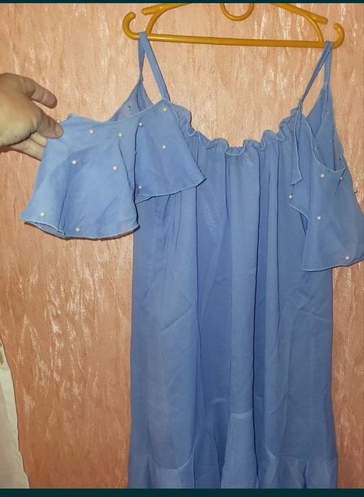 Туника парео с воланом на плечах и жемчугом 44р
Длина 88
Пог 44