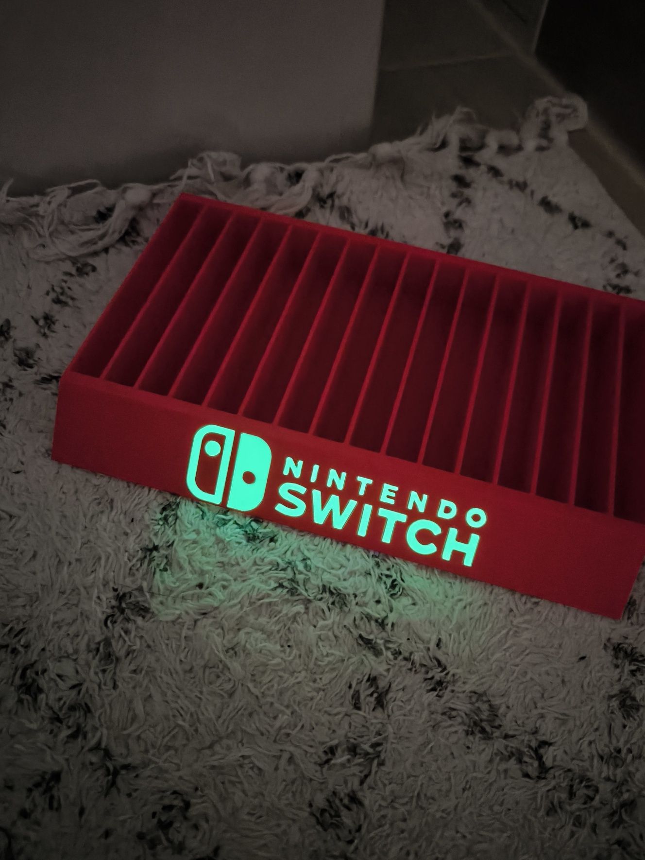 Stojak podstawka na gry Nintendo Switch napis fluorescencyjny