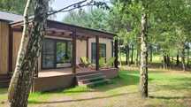 Domek Wkra Kajaki Sauna Jacuzi MiniGolf Tyrolka Hamak własna plaża 4ha