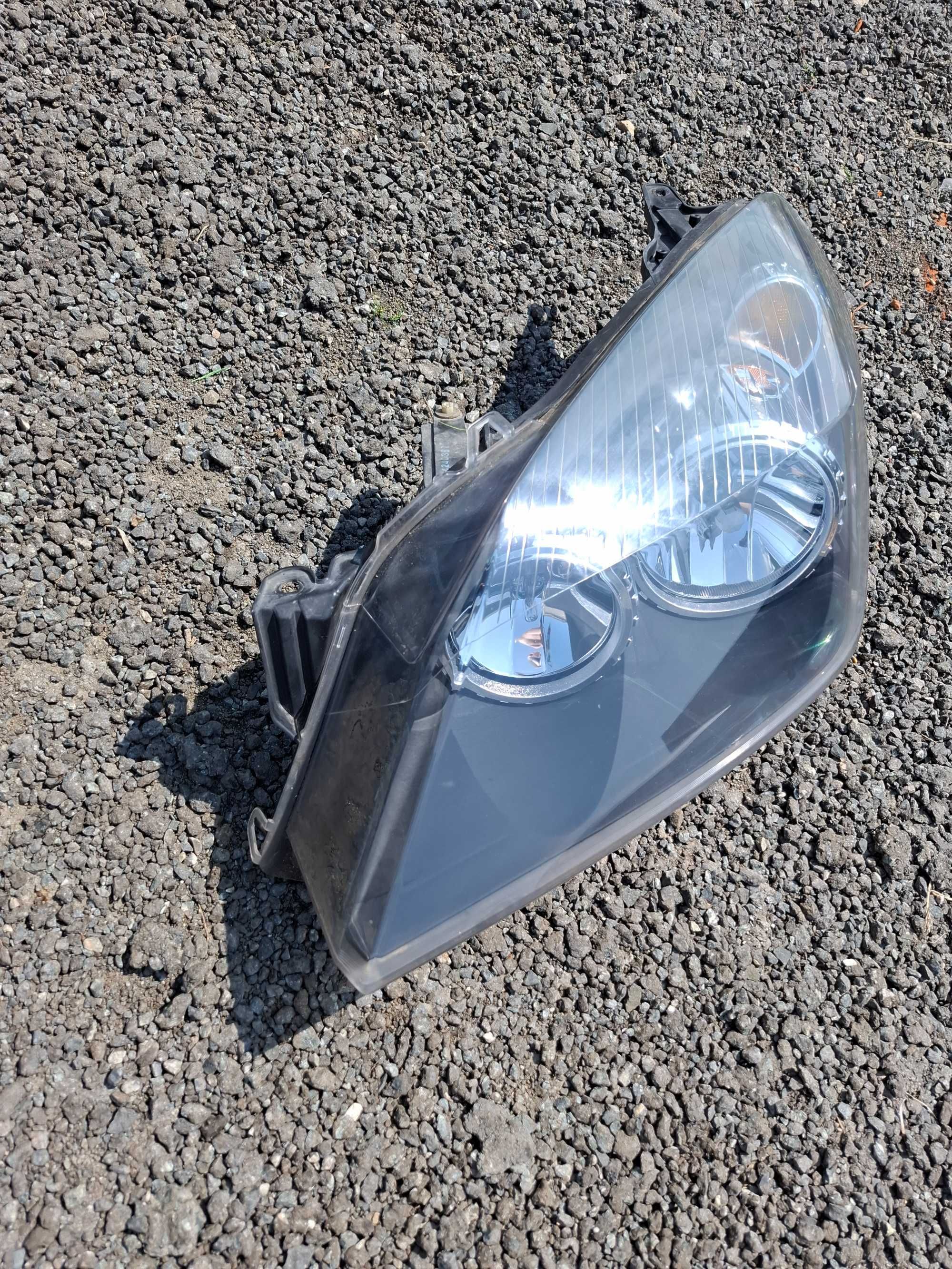 Reflektor lewy przód Opel Astra H