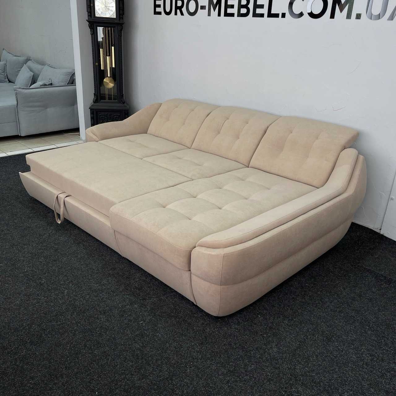 Кутовий диван в тканині розкладний