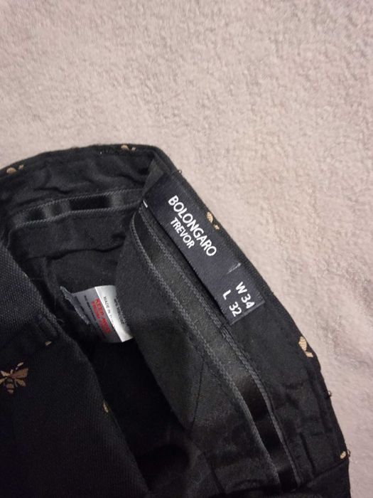 Spodnie garniturowe w pszczółki rozmiar 34/32