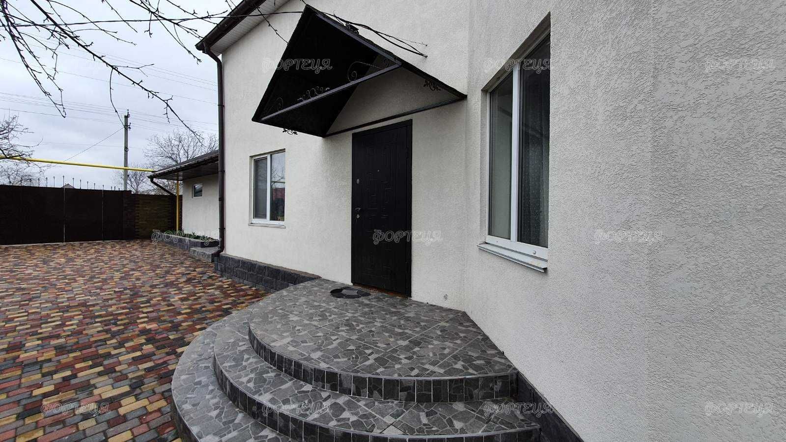 Продажа дома в Подгородном с гаражом на два авто