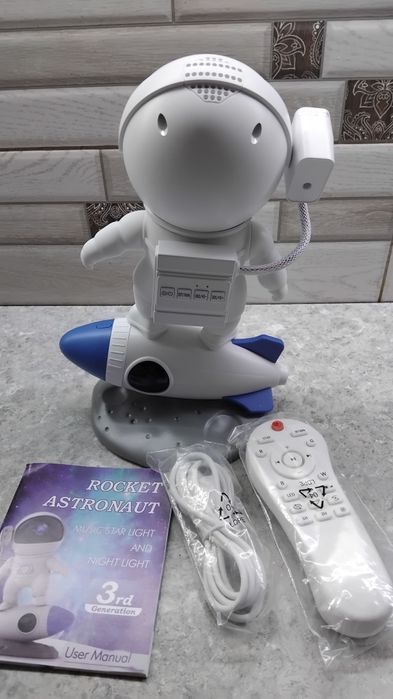 Музичний зоряний світильник і нічник космонавт Rocket Astronaut...