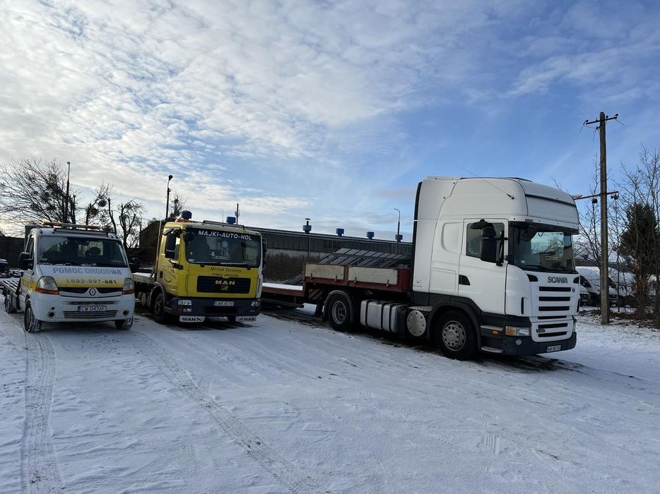 Autolaweta autoholowanie pomoc drogowa laweta transport niskopodwozie
