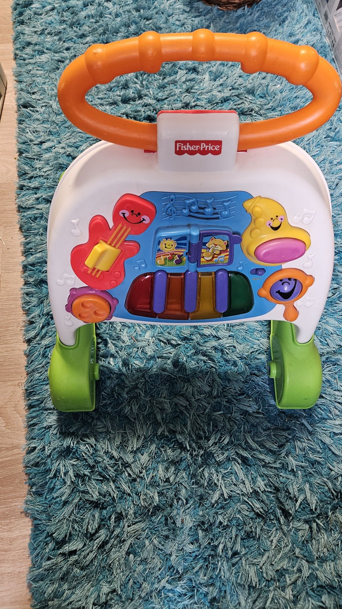 Muzyczny chodzik pchacz Fisher Price