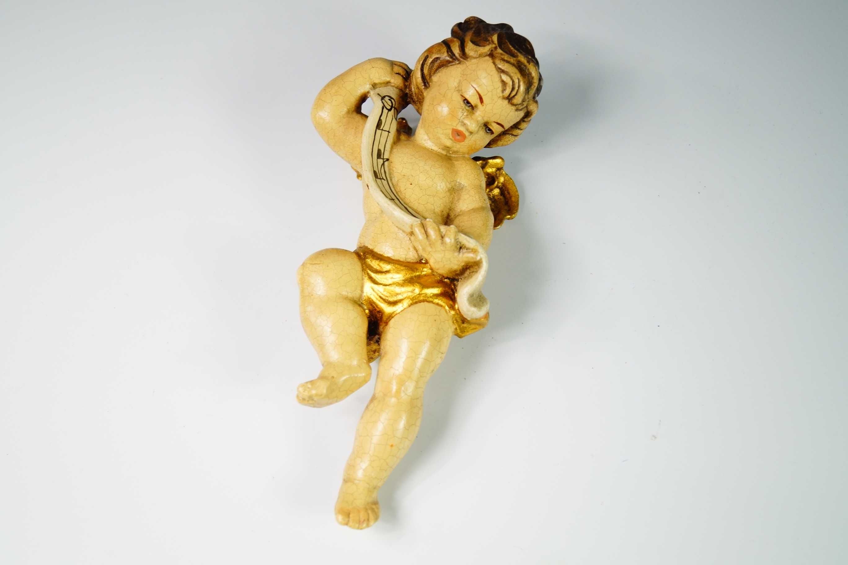 Rzeźba w polichromii putto z nutami drewno figura
