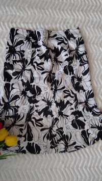 Spódnica czarno biała w kwiaty elegancka midi fashion  rozkloszowana