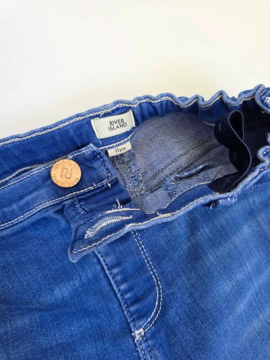 Крутые синие джинсы river island девочке с потертостями рваные