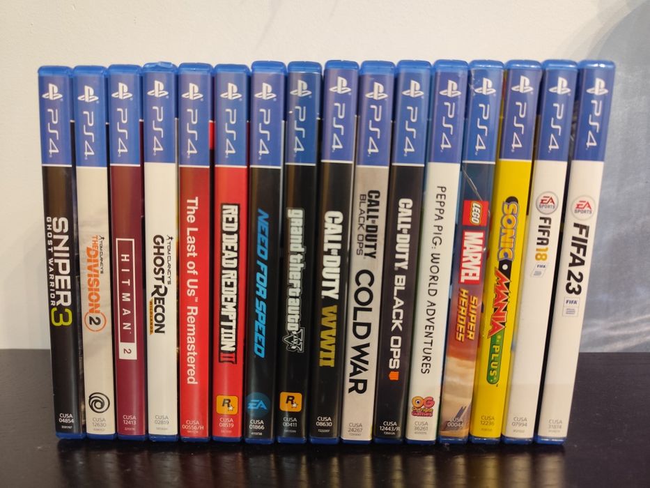 PS4 Slim 1TB com 2 comandos e 16 jogos.