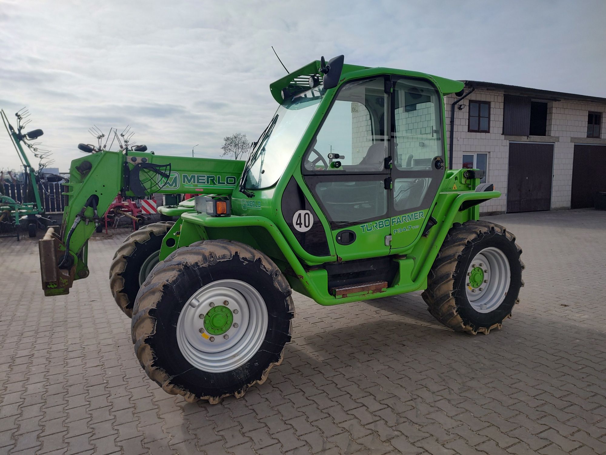 Ładowarka teleskopowa Merlo P 34.7 TOP JCB 2012