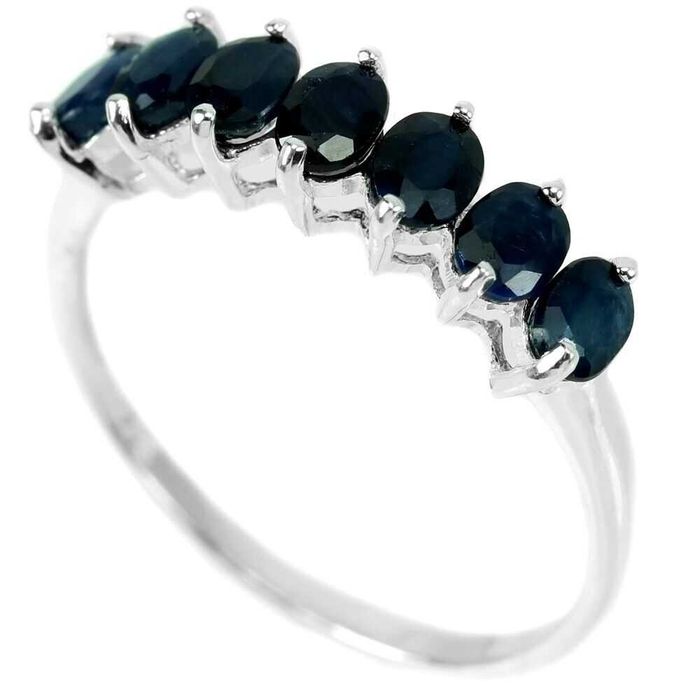 Серебряное кольцо "вечность" с синим сапфиром. Размер 19.25: