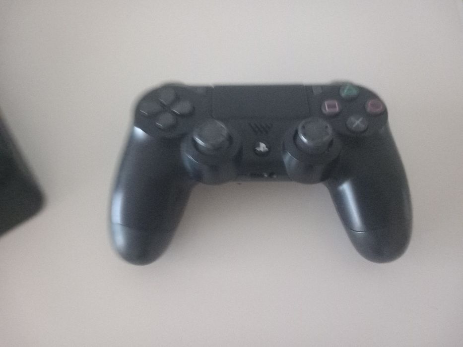 PS4     1 TB     Nova com cabos