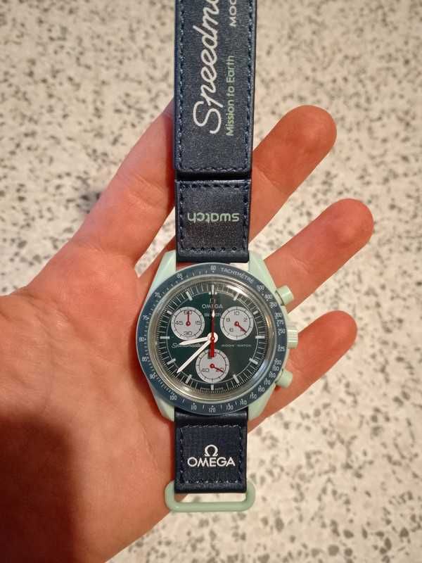 Omega Swatch SO33G100 – Dom w Kosmosie