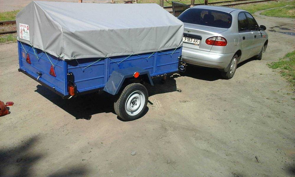 Міцний причіп до автомобіля  від заводу виробника 2000*1300*400