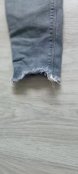 River Island spodnie dziewczęce szary jeans dziury przetarcia EU 34/8