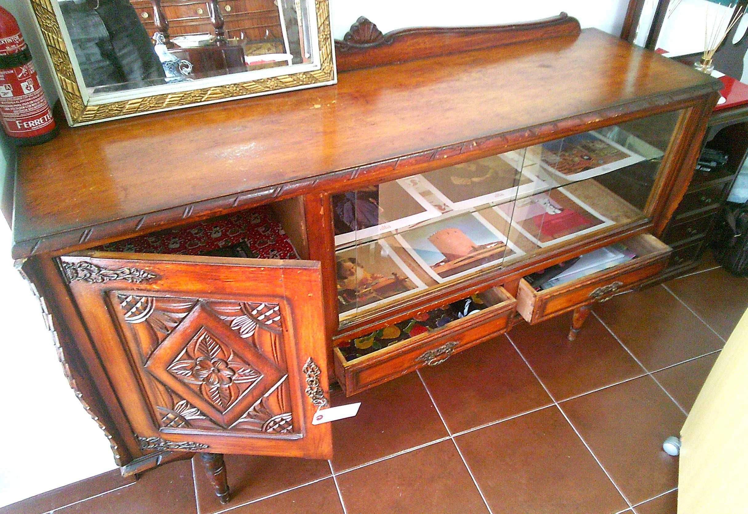 Elegant antique credenza—beautiful carvings and different wood shades