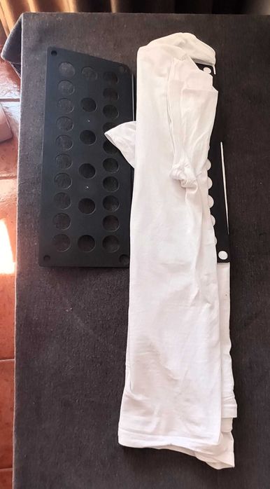 Dobrador roupa crianças