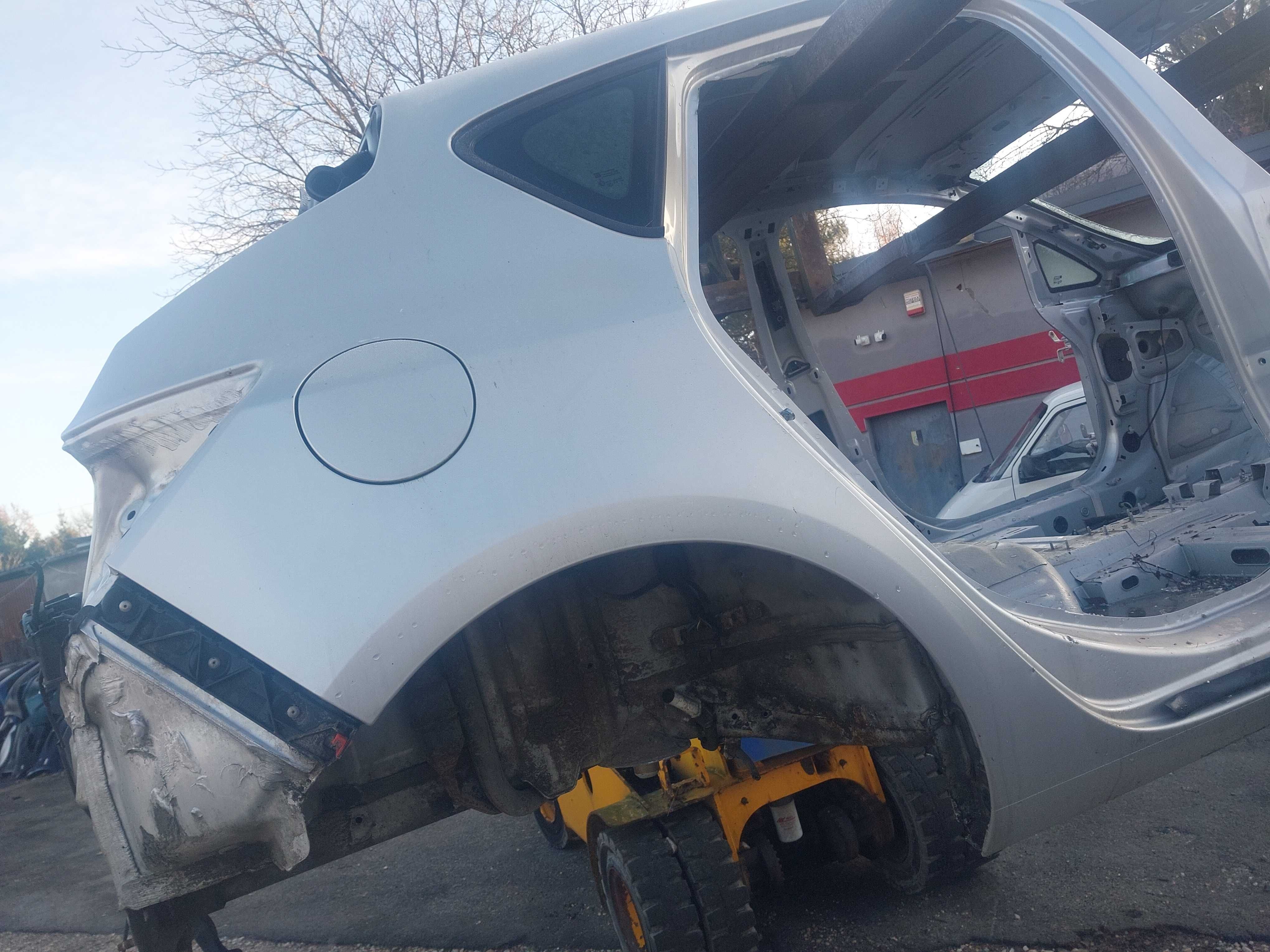 Blotnik prawy tyl tylni opel astra j  hatchback