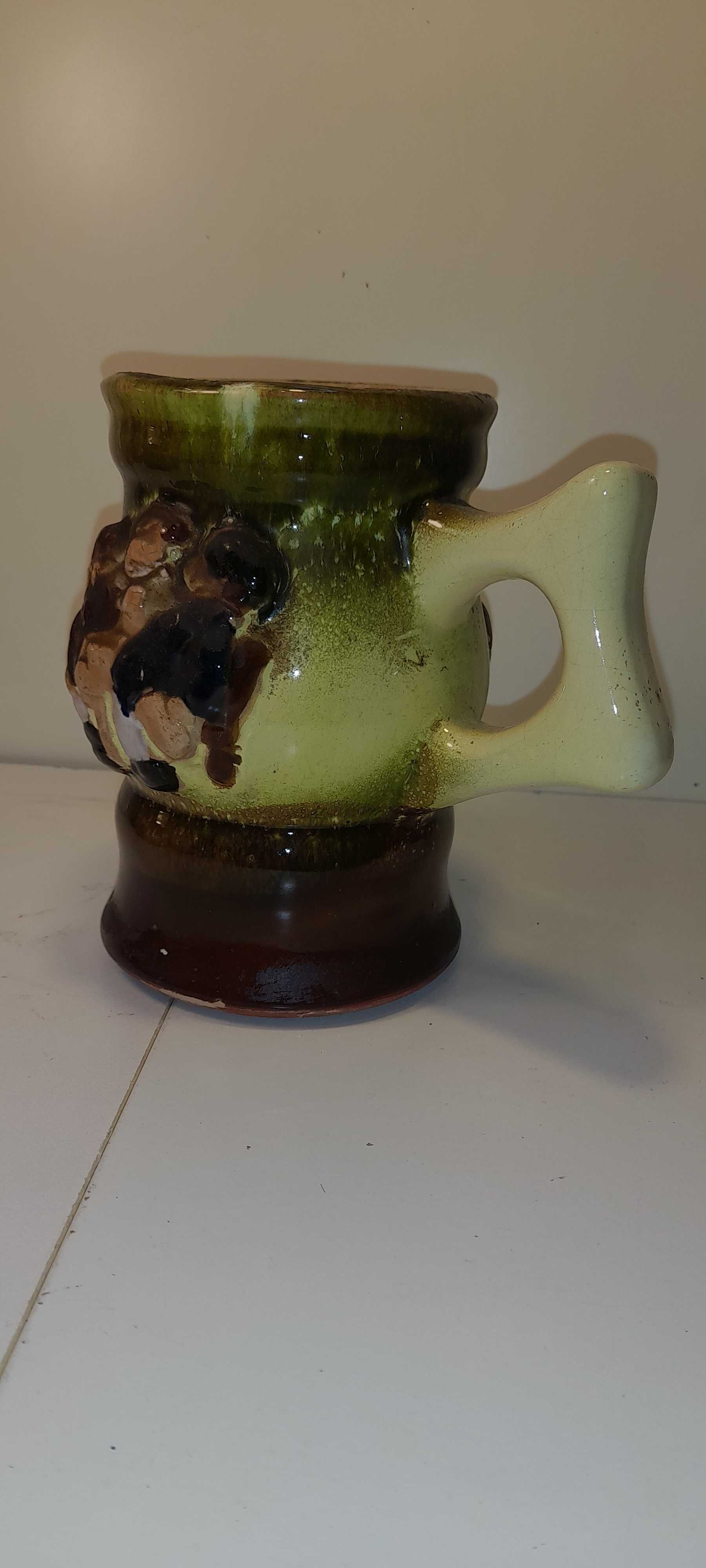 Stary kufel ceramiczny .