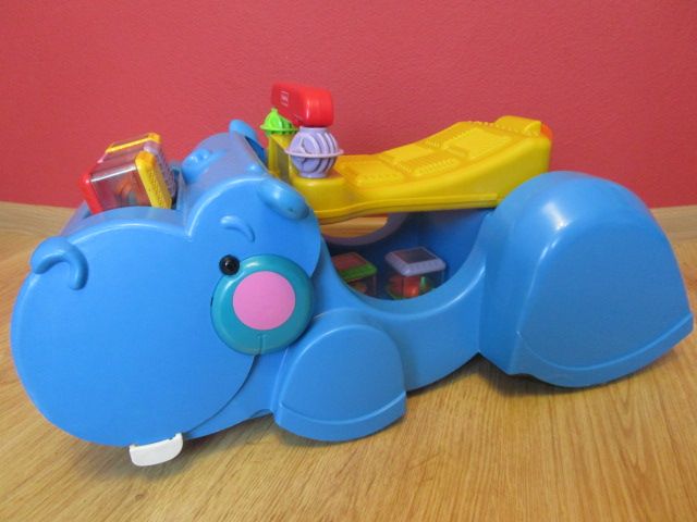 Fisher Price Hipopotam- jeździk, pchacz