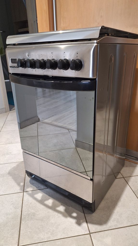 Kuchnia gazowo-elektryczna Hotpoint-Ariston C 35S P6 (X) stan wzorowy