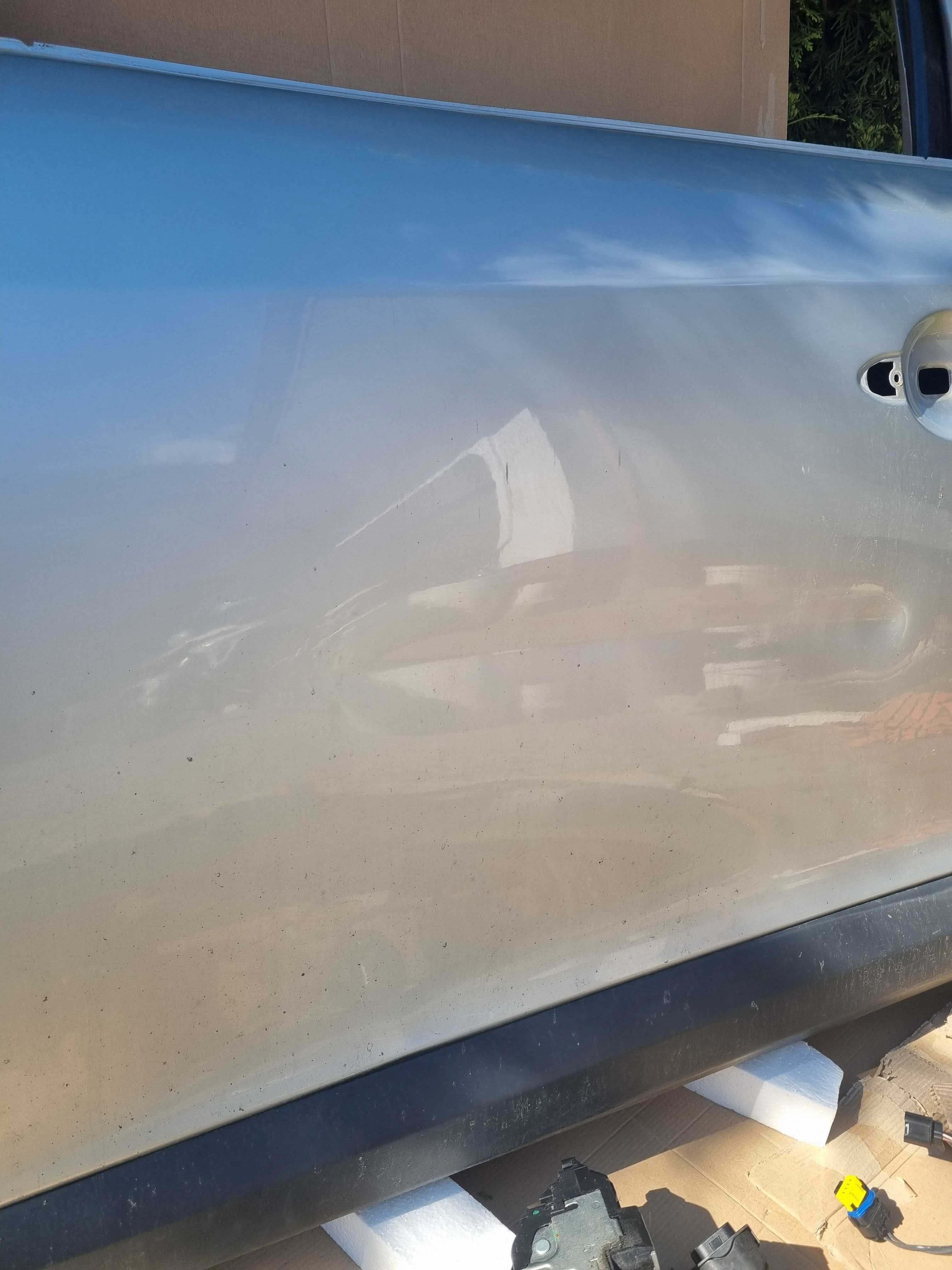 Renault Megane III kombi 2010, drzwi lewy przód, kolor TED69 srebrny