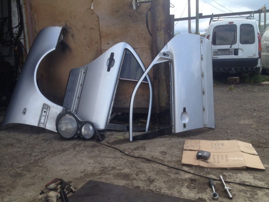 Двері на мерседес 210,124,202,203,140