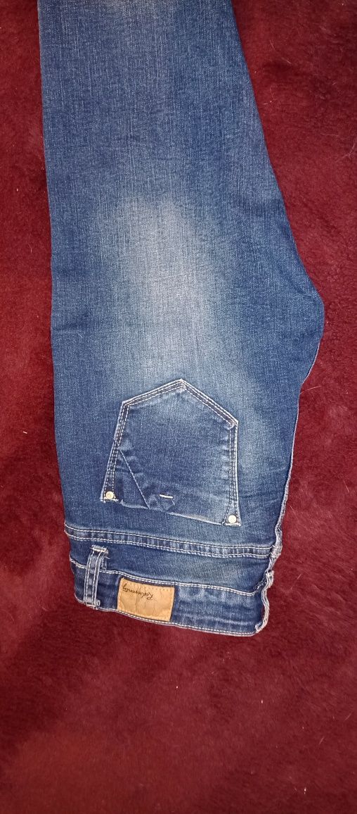 Spodnie jeans 38/M