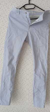 Spodnie jeans w paski niebiesko - białe Sinsay