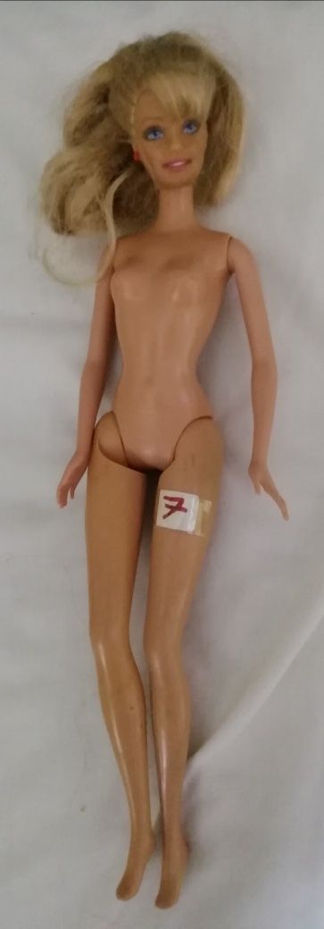 Bonecas tipo barbies elegantes