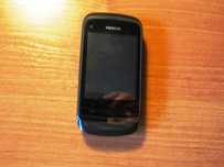Telefon komórkowy Nokia C2-02 z ładowarką