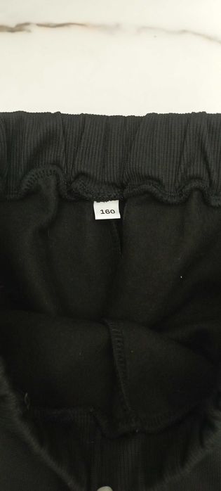 Нові теплі спортивні штани на зріст 160 см