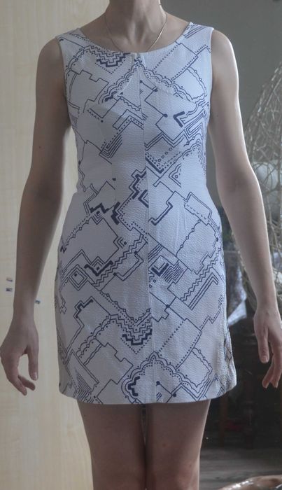 Biała krótka sukienka rozm.34