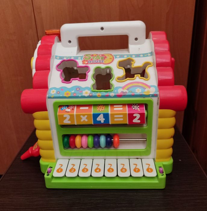 Дитячий розвиваючий, музичний будиночок сортер.