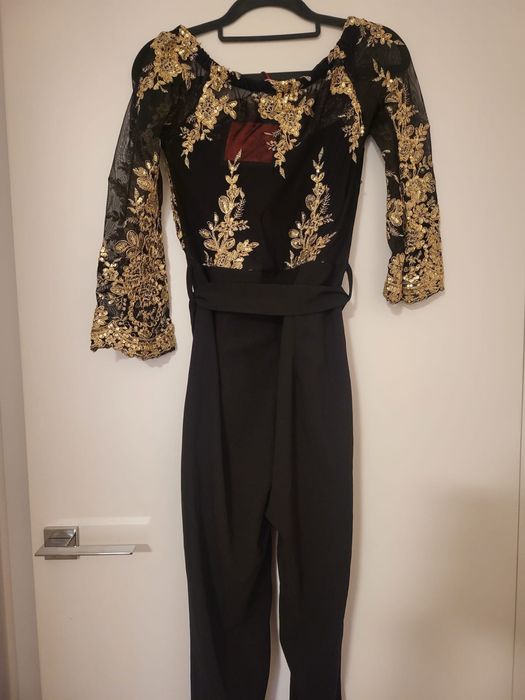 kombinezon nowy z metka