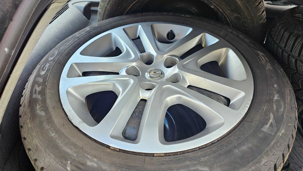 Zimowe OPEL ASTRA K 5x105 6,5J ET41 Dębica 205/55/16 czujniki