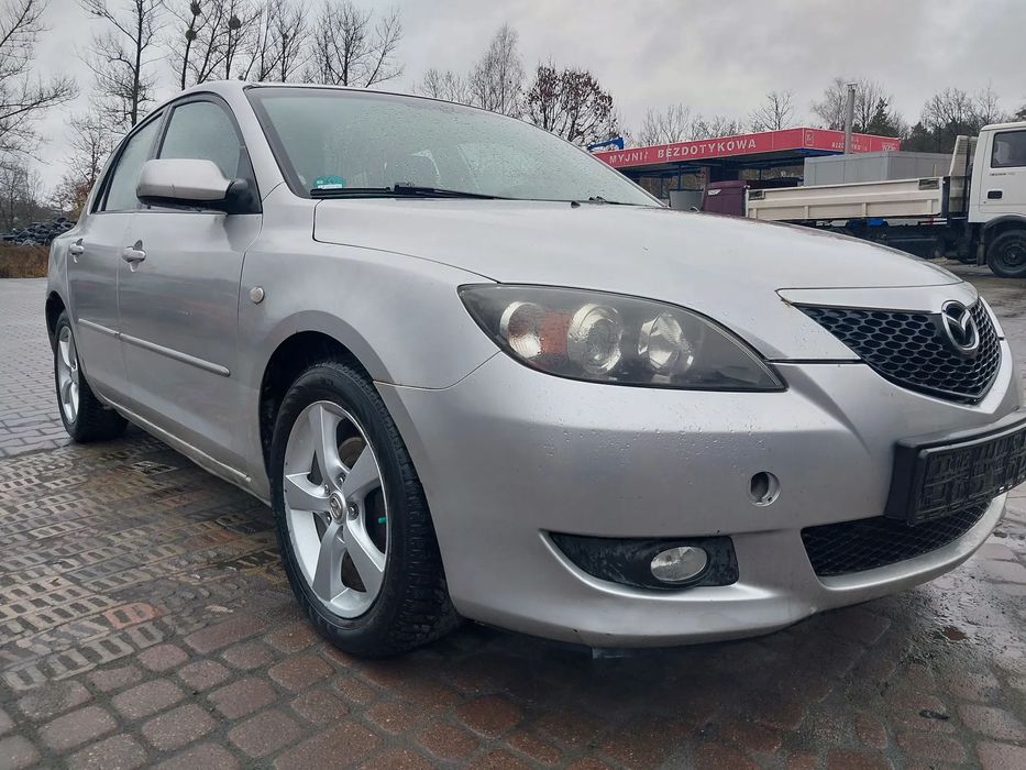 Mazda 3 I BK silnik 1.6 16v Z601 105KM skrzynia biegów manualna drzwi prawe lewe przód tył maska klapa zderzak błotnik BN9R szyba lampa pas próg podłużnica błotnik radio fotel kierownica multifunkcja panel belka oś CAŁY NA CZĘŚCI