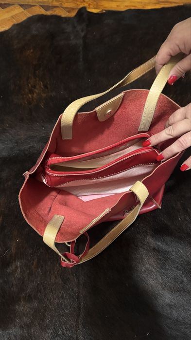 Mala Rufel vermelha em pele