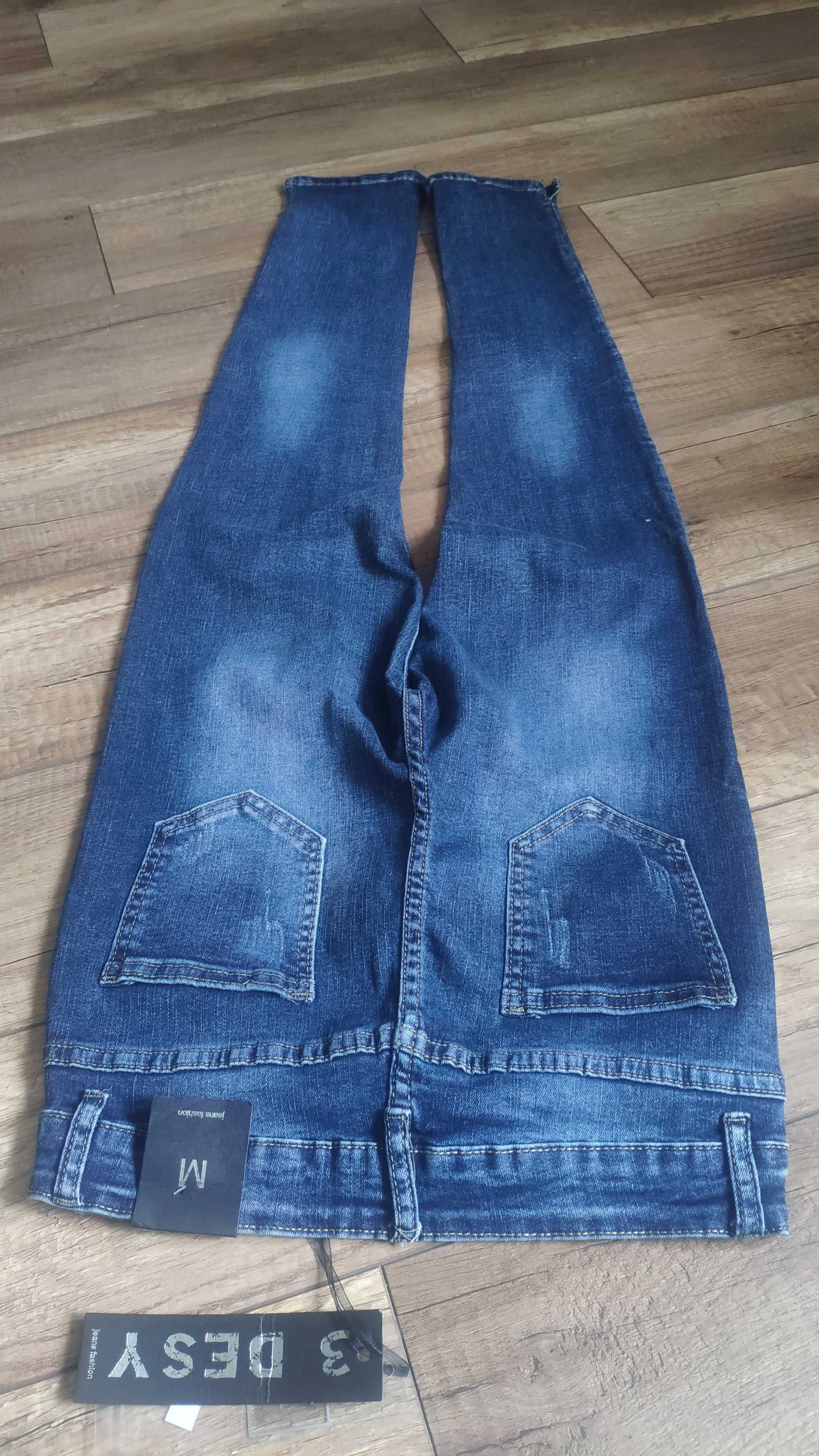 Spodnie jeansy model skinny jeans lekko przecierane xs-s