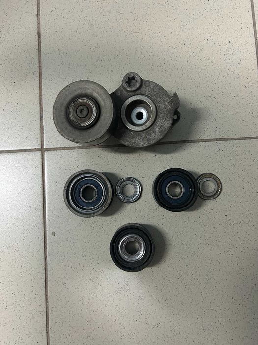 обвідні ролики та натягувач ременя для VW Амарок 3.0