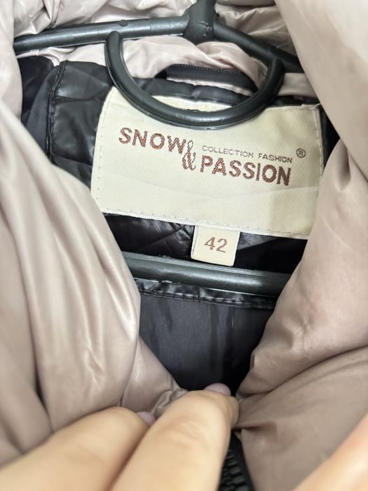 Теплюща зимова куртка