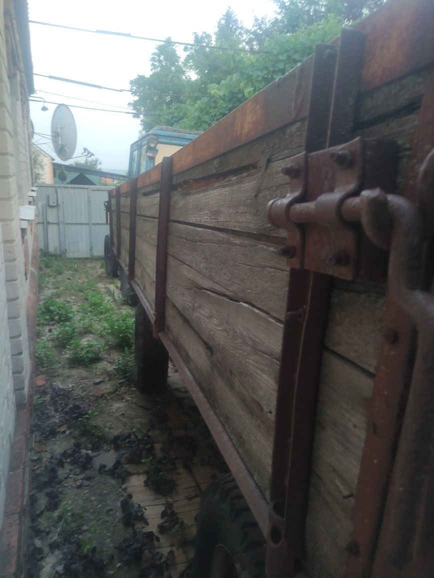 Продам трактор МТЗ 80 з прицепом 2 ПТС 4